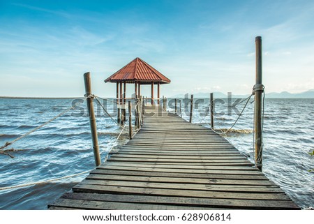 Waterfront pavilion in the sea, made of wood