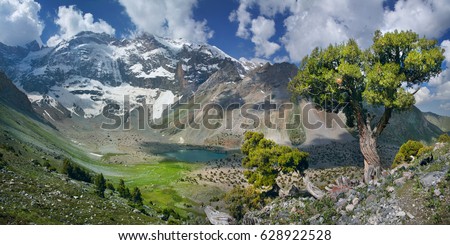 Tourism in Tajikistan, valley in the Fan Mountains, panorama nature Royalty-Free Stock Photo #628922528