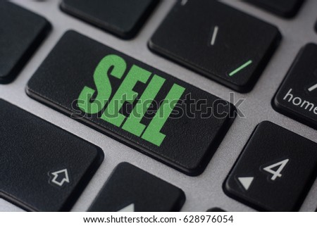 Key with text Sell on laptop keyboard