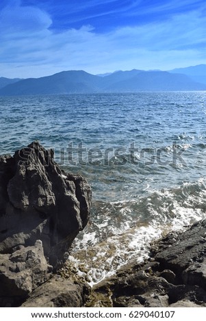the beauty of the sea and nature on a rocky beach  "Bay of Kotor"  ("Boka Kotorska"), Montenegro