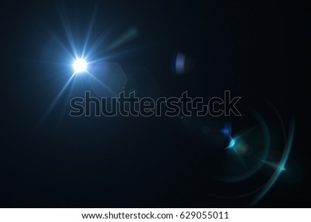 digital lens flare with bright light in black background used for texture and material Royalty-Free Stock Photo #629055011