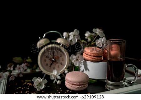 Morning with macaron on the  black background 