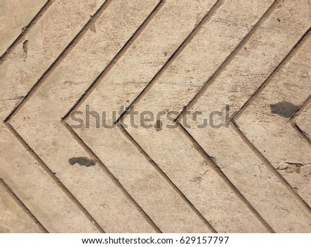 Cement floor with arrow line for pattern texture background