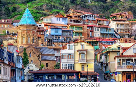 Colorful traditional houses with wooden carved balconies in the Old Town of Tbilisi, Georgia Royalty-Free Stock Photo #629182610