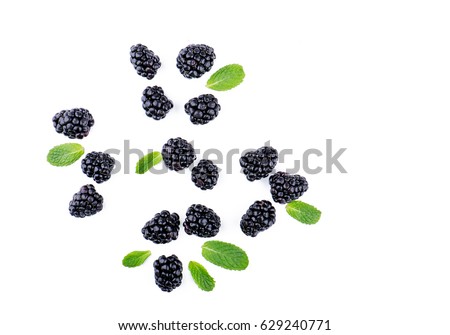 Blackberries and leaves top view Royalty-Free Stock Photo #629240771