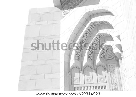 in oman the wall of big muscat mosque abstract background and antique Royalty-Free Stock Photo #629314523