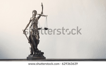 Statue of justice Royalty-Free Stock Photo #629363639