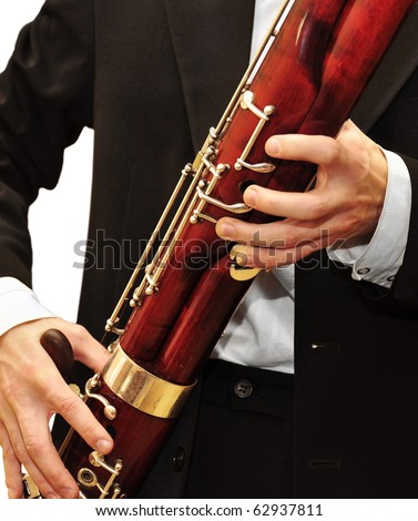 Playing bassoon Royalty-Free Stock Photo #62937811