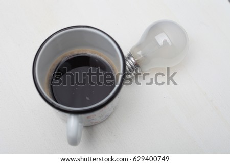 Coffee is always a good idea. Business concept. On a white wooden background. Horizontally.