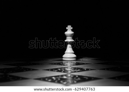 Chess photographed on a chess board Royalty-Free Stock Photo #629407763