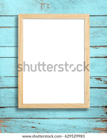 Picture frame on vintage wood wall.