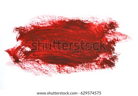 Red brush strokes oil paints on white paper. Isolated on white background. Abstract creative background
