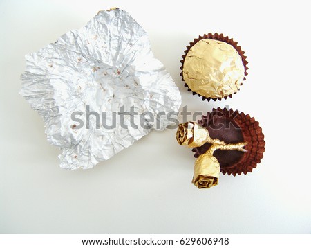 Chocolates and roses made with chocolate wrapper  Royalty-Free Stock Photo #629606948