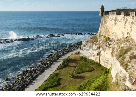 View of the coastline and outside wall of Fort El Morro in San Juan, Puerto Rico