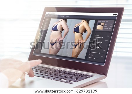 Professional man using laptop to transform chubby woman slim. Heavy photo editing with computer software. Standard of beauty, body image and post production concept.