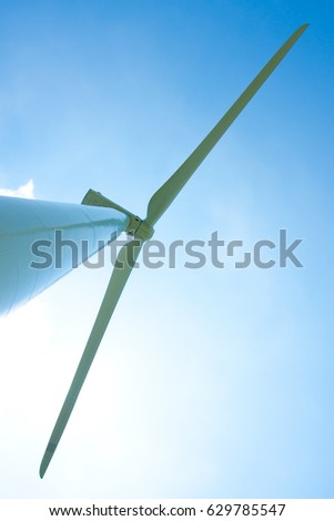 Photo of Wind power installation in sunny day