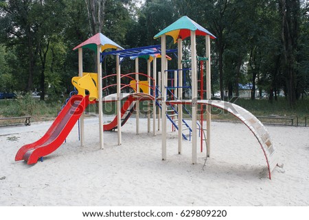 Empty playground in the yard of the house