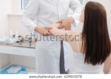 Nice pleasant woman holding her hand up Royalty-Free Stock Photo #629855078