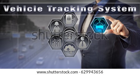 Blue chip manager locating a car via a virtual Vehicle Tracking System user interface. Service industry concept for fleet management, asset tracking, stolen vehicle recovery and surveillance. Royalty-Free Stock Photo #629943656