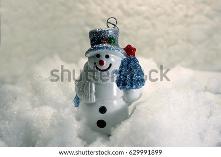 Christmas tree toy on a gray background