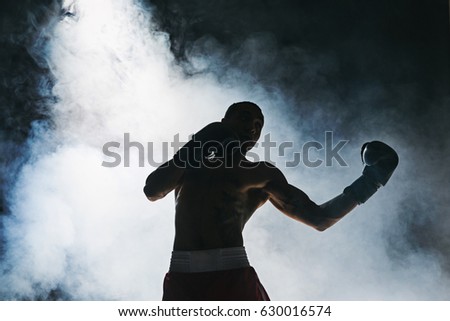 Afro american male boxer. Royalty-Free Stock Photo #630016574
