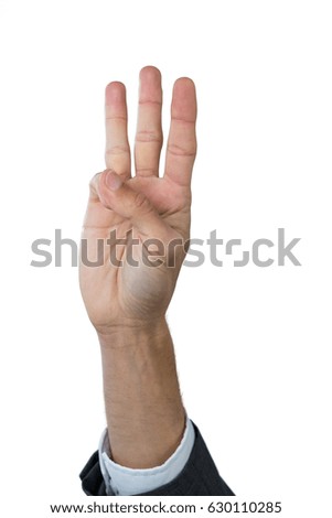 Hand of businessman gesturing against white background