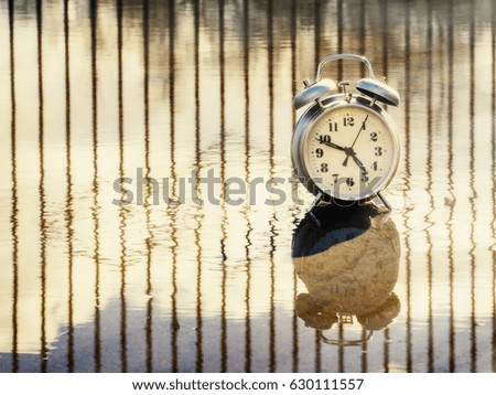 Vintage table clock.Image is created by nature and time.Selective focus.