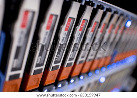 Close up Storage in Disk Shelves on Data Center Server Rack