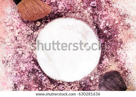 A closeup of makeup brushes on a white marble background, with traces of powder and blush forming a frame. A horizontal template for a makeup artist's business card or flyer design, with copy space