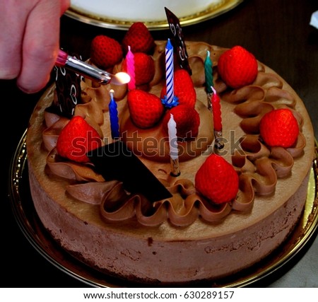 Lighting a birthday cake