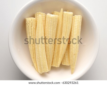 Top view of Baby corn in a white bowl
