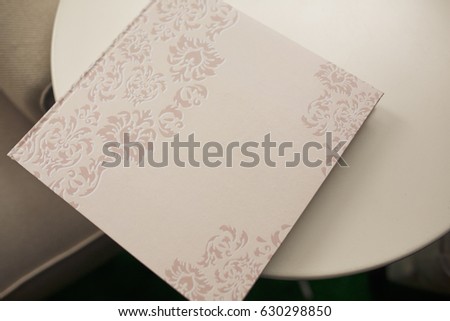 White wish book lies on white table
