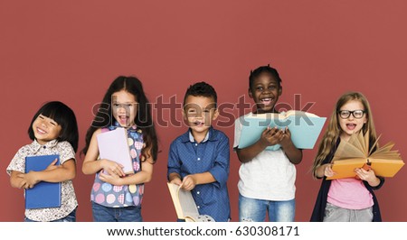 Group of Diverse Kids Reading Books Together Studio Portrait