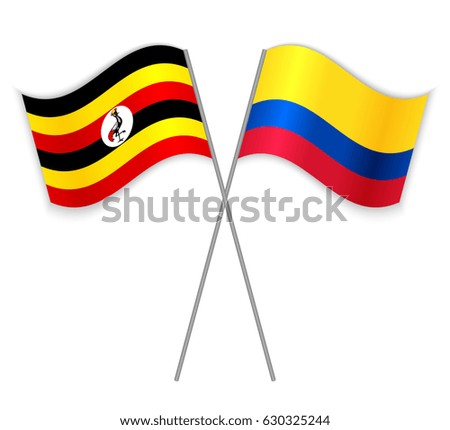 Ugandan and Colombian crossed flags. Uganda combined with Colombia isolated on white. Language learning, international business or travel concept.