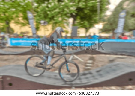 Picture blurred for background abstract and can be illustration Blurred background of Cyclist during the competition