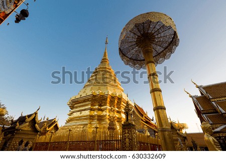 Beautiful buddhist Wat Phra That Doi Suthep temple in Chiang Mai in northern Thailand. Pictures of religion architecture in south east Asia during sunrise.