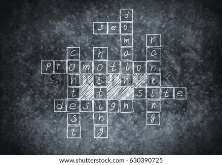 Studying concept with crossword drawn on blackboard