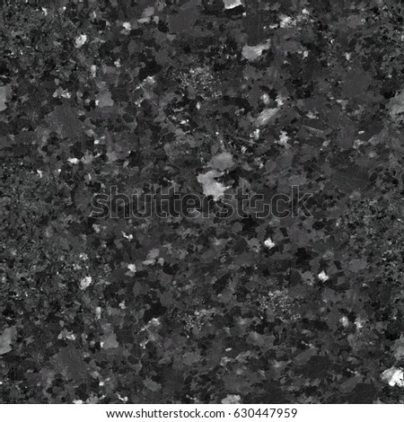 Dark granite texture close up. Seamless square background, tile ready. High resolution photo.