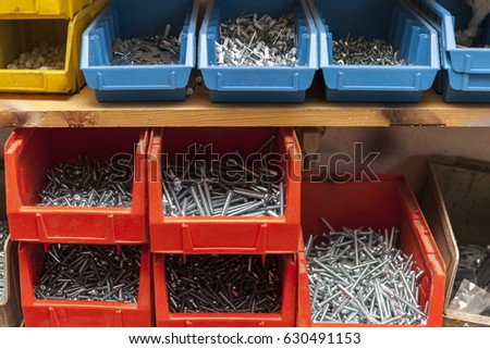 box with screws and nails, close up