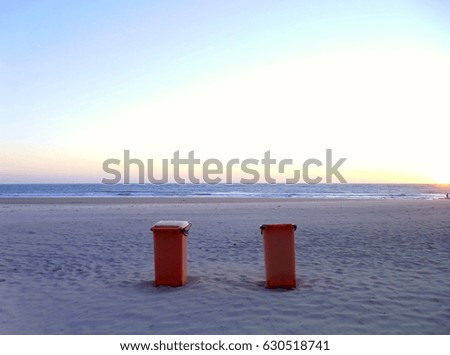 Garbage cans on the beach in the city of Cadiz, Andalusia. Spain