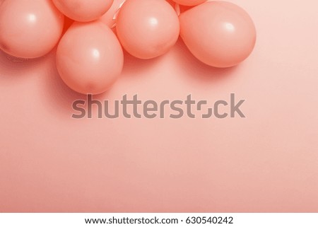 pink balloons on the pink background.