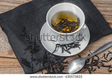 Cup of tea on a wooden background
