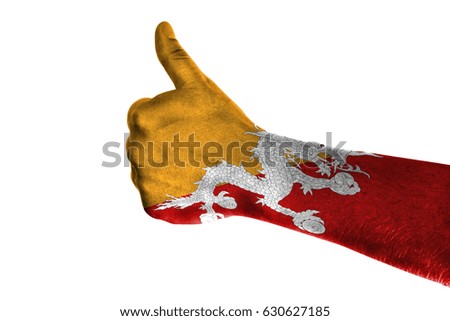 Hand making thumbs up sign. Butane painted with flag as symbol of thumbs like,up,okay. Isolated on white background.