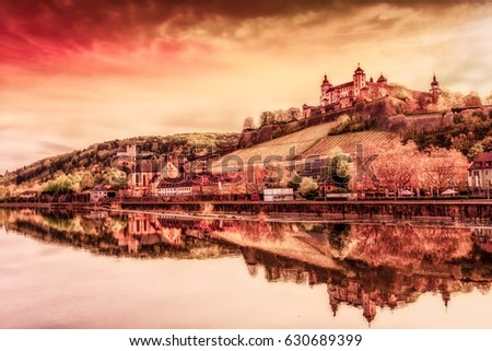 Color vintage painting style Wuerzburg Fortress Marienberg and river Main red toned panorama with water reflections, buildings, trees, riverside 