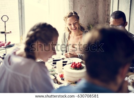Friends Gathering Together on Tea Party Eating Cakes Enjoyment happiness
