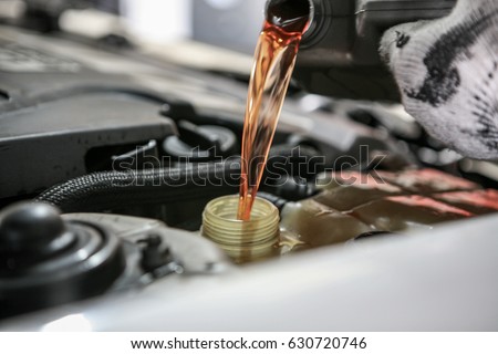 Automobile maintenance / engine oil, coolant exchange Royalty-Free Stock Photo #630720746