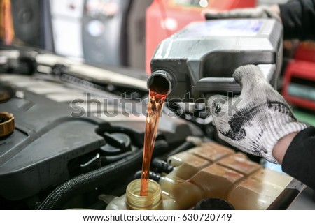 Automobile maintenance / engine oil, coolant exchange Royalty-Free Stock Photo #630720749