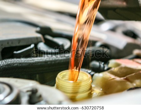 Automobile maintenance / engine oil, coolant exchange Royalty-Free Stock Photo #630720758