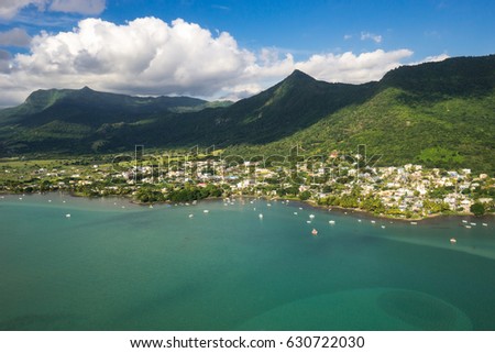 Aerial view of the mauritian mountains and the village of La Galette. Mauritius. Picture taken from helicopter