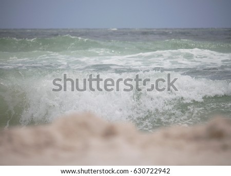 Photograph of the Sand, Waves and Sky on Orange Beach, Alabama